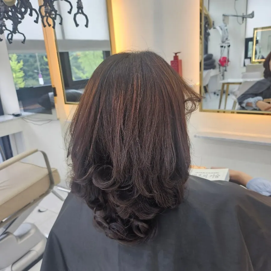 Finished layered short-bob C-curl perm