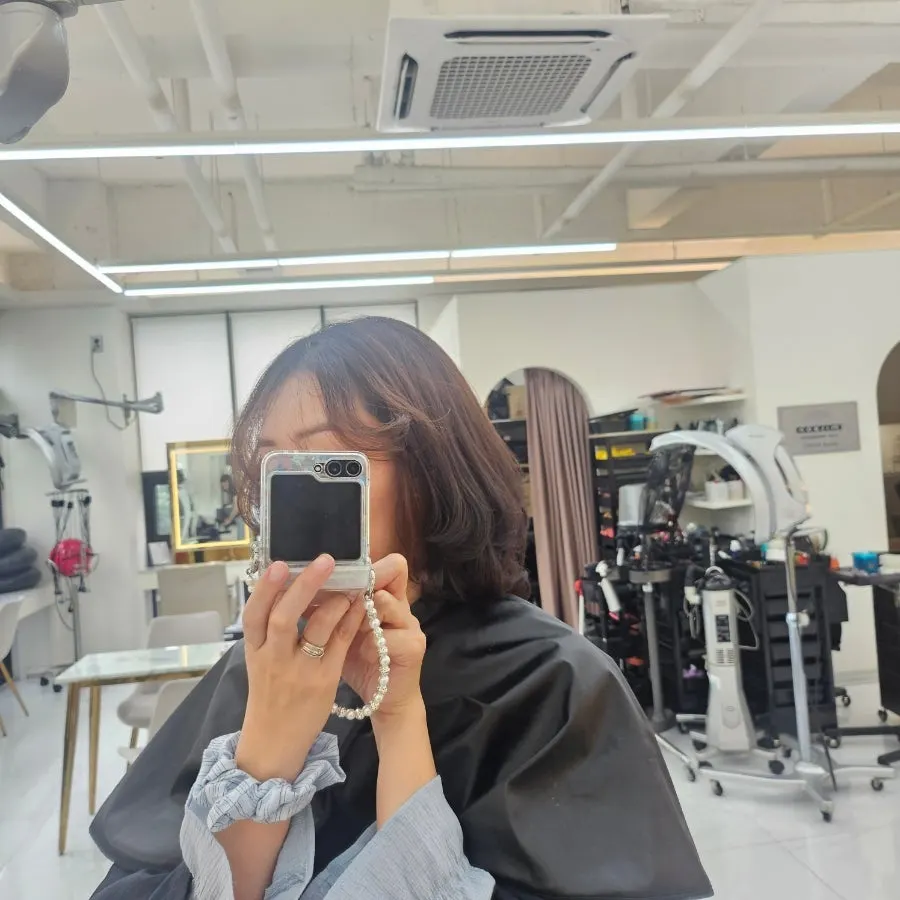 Hairstyle after a perm for damaged hair