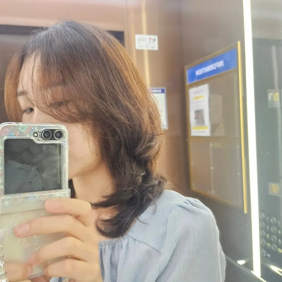 Natural layered perm style