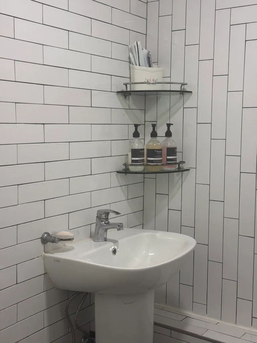 Tidy mirror area in the powder room