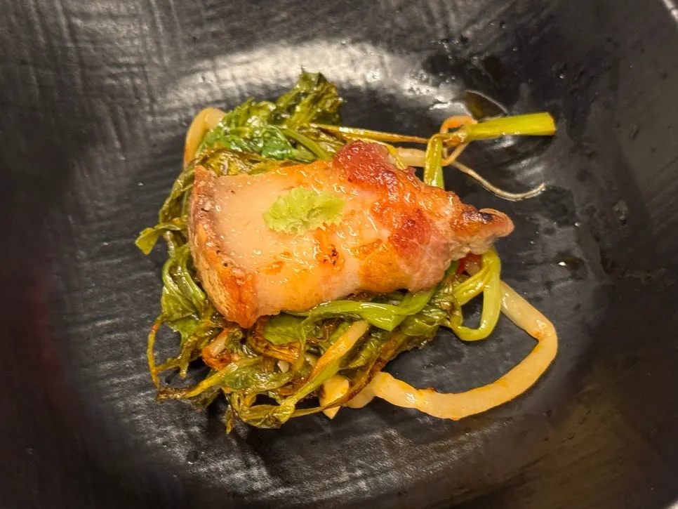 Close-up of a piece of pork belly with the skin still attached