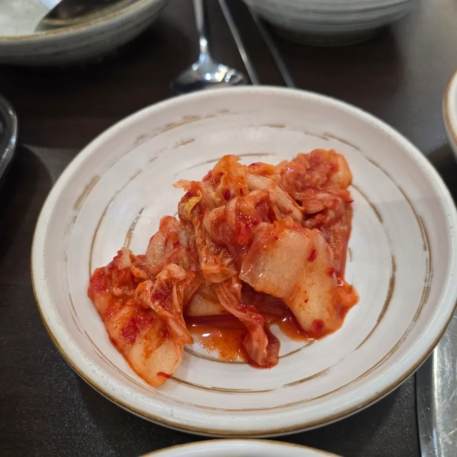 Ham and glass noodles inside the budae-jjigae