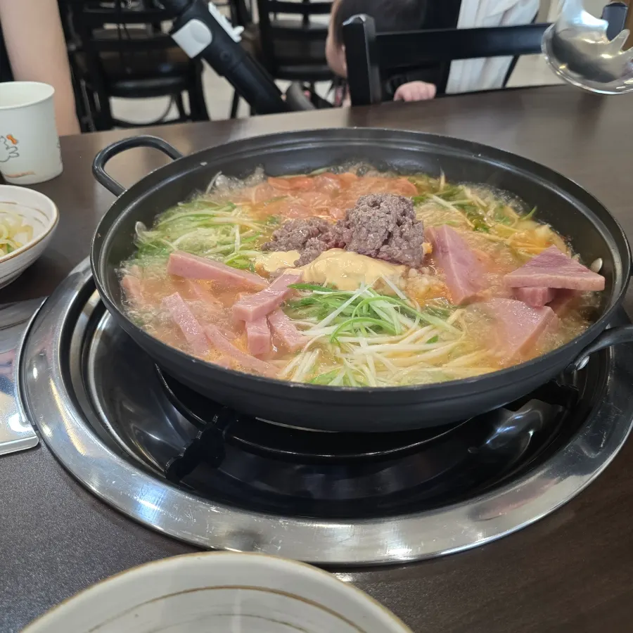 Self-serve side dish bar with dongchimi and baek-kimchi