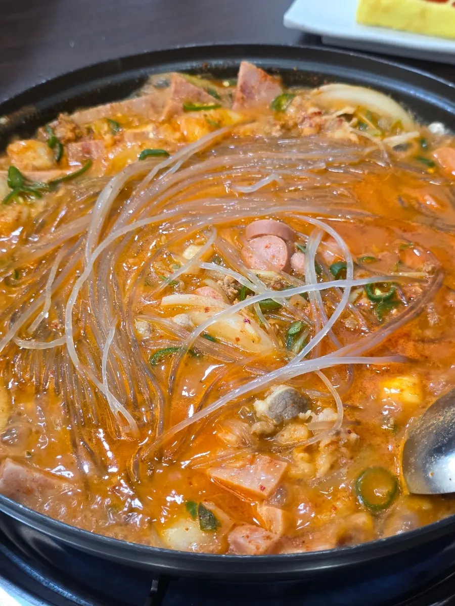 Pot of Cheongwon budae-jjigae starting to boil