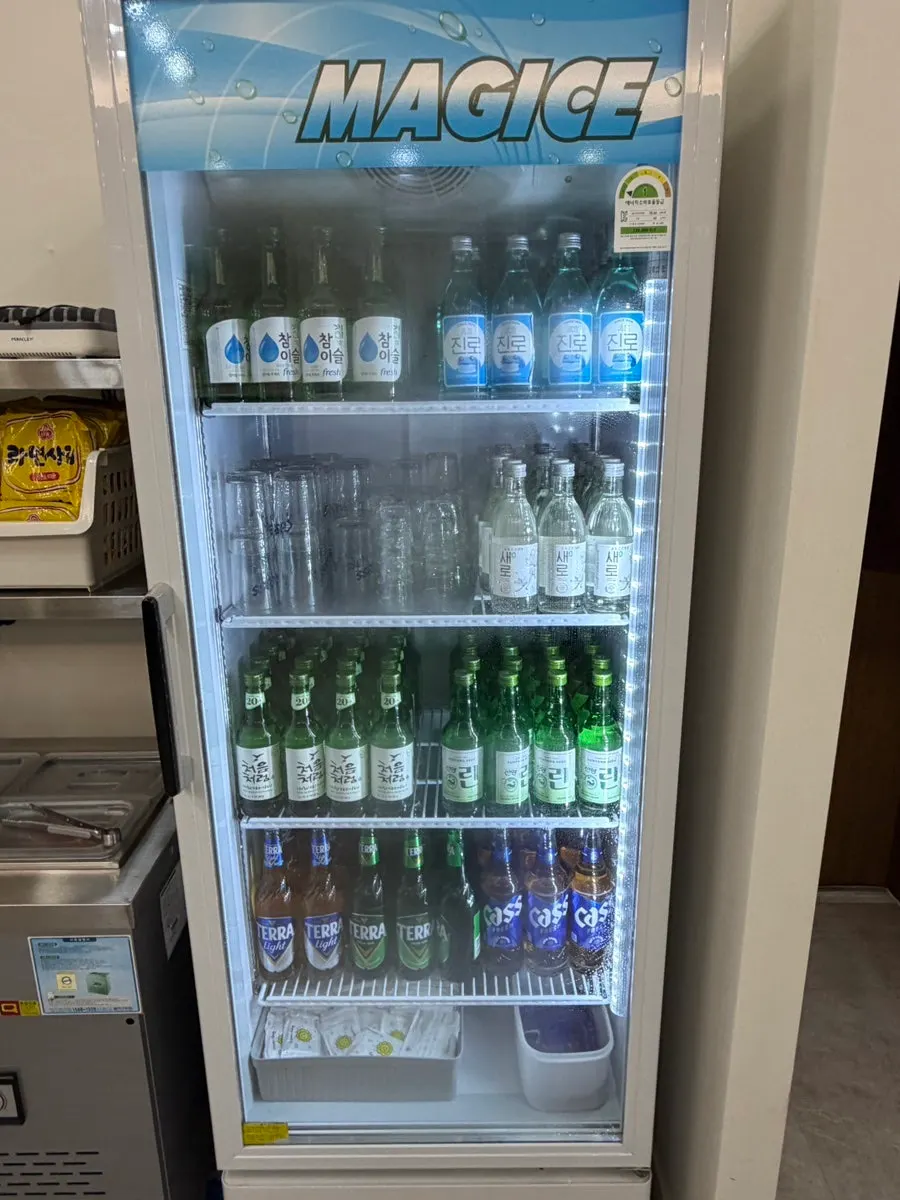 Fridge stocked with alcohol and drinks in the restaurant