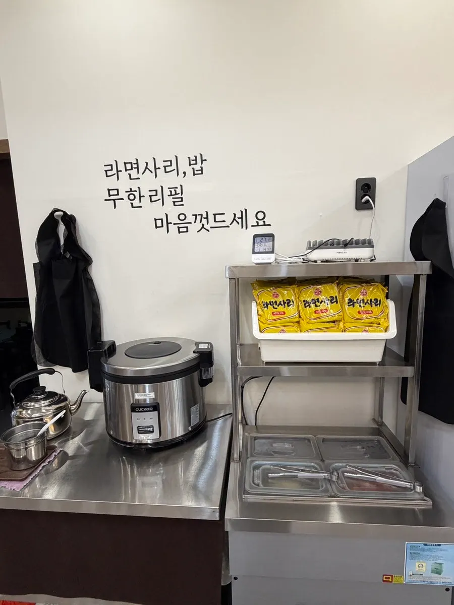 Self-serve bar with rice and ramyeon noodles