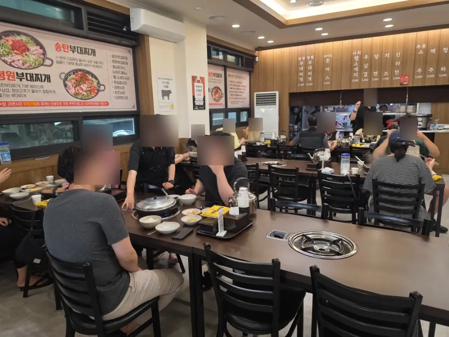 The interior of Cheongwon Restaurant packed with customers on a weekday afternoon