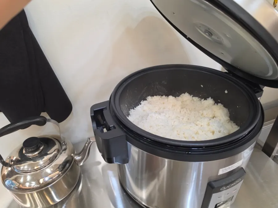 A rice cooker full of warm rice