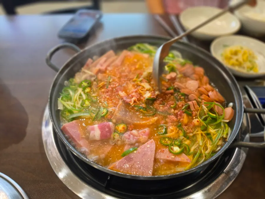 Budae-jjigae with triangle ham, square ham, and cheongyang chili peppers