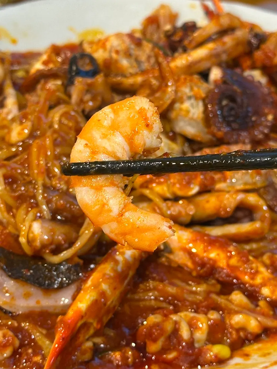 Thick octopus tentacles in the seafood stew