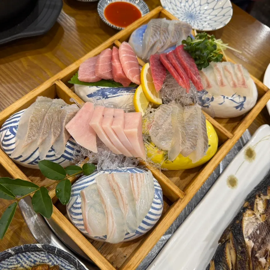 Assorted sashimi served on a stone plate