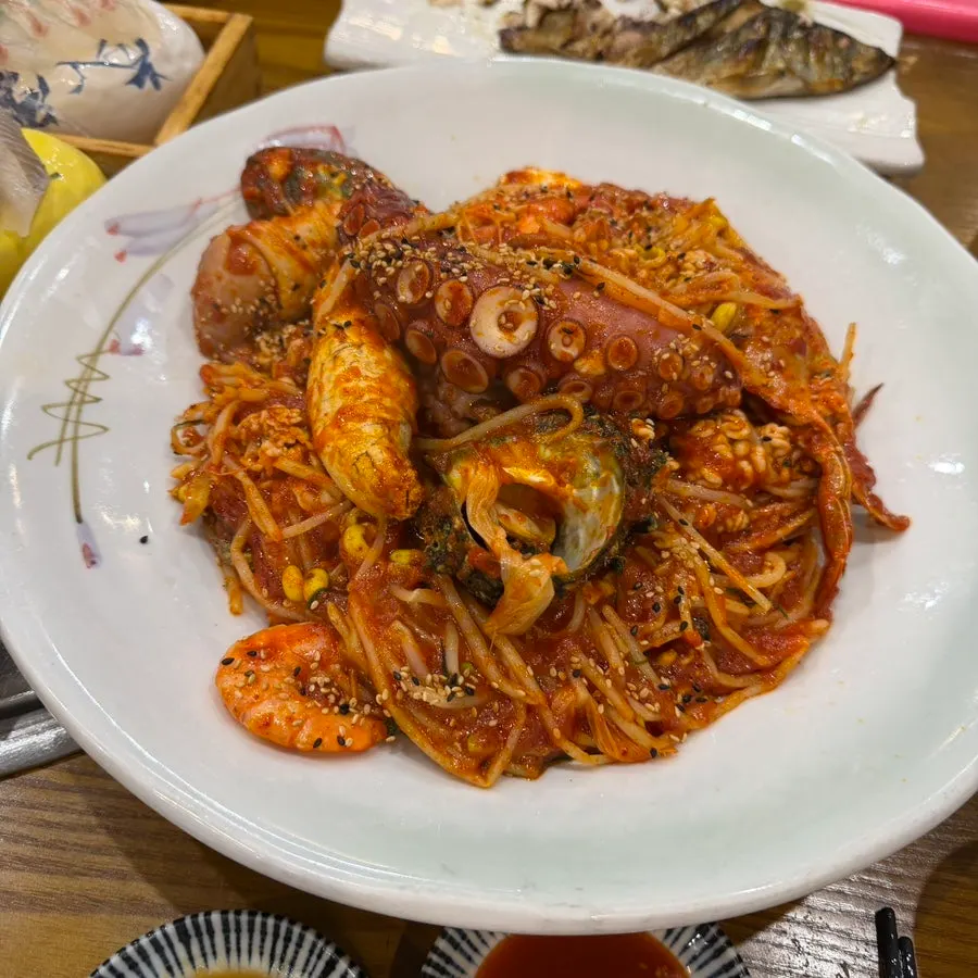 A seafood stew piled high with ingredients