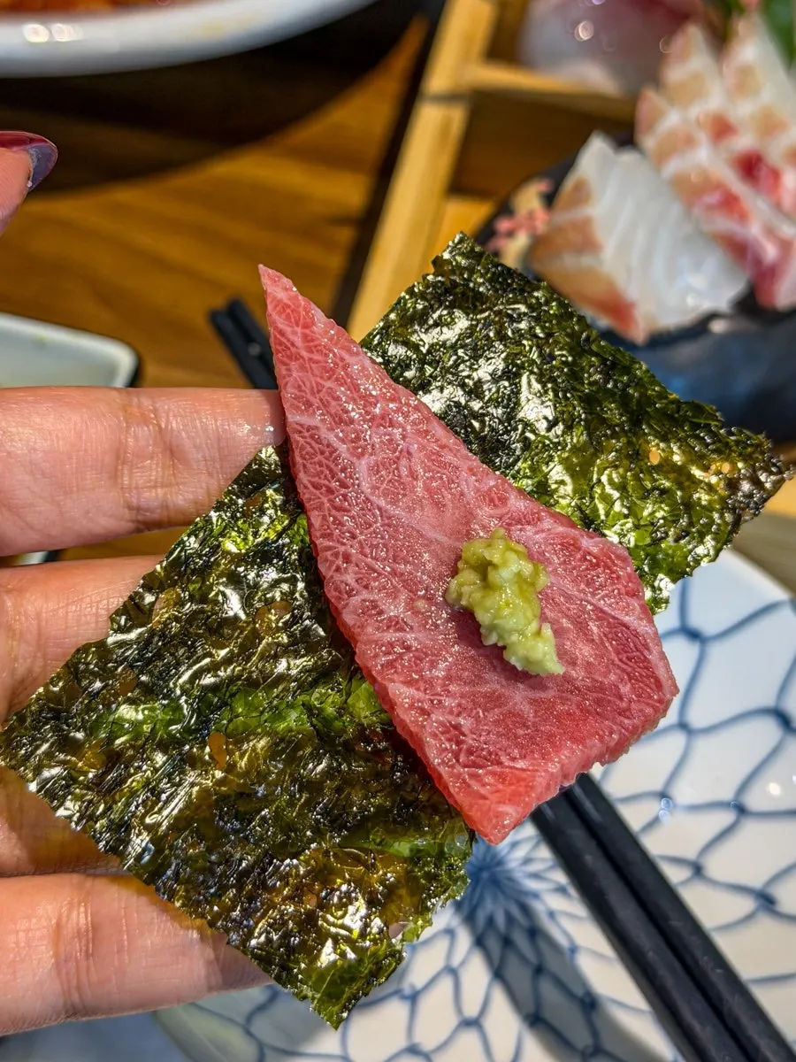 Close-up of thickly cut live fish sashimi