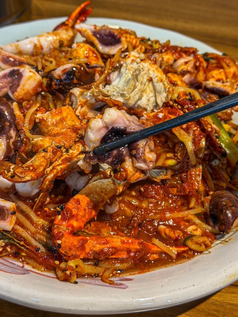 Seafood stew with abalone, octopus and blue crab