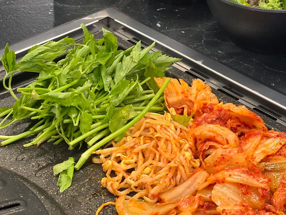 Minari, scallion salad, and other side dishes