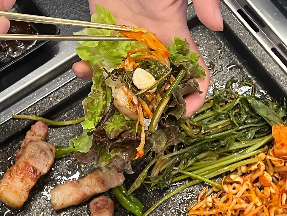 A piece of pork belly with mushroom wasabi