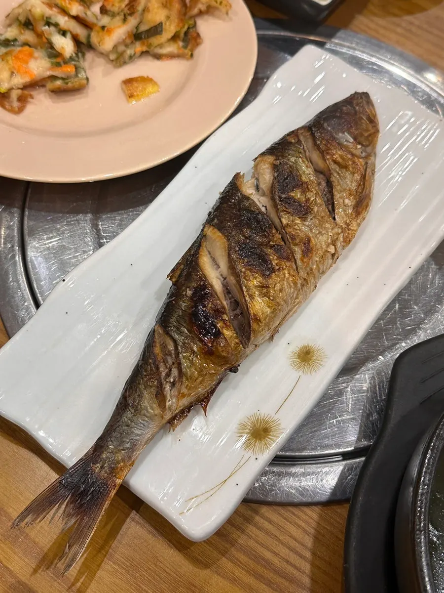Grilled herring full of roe