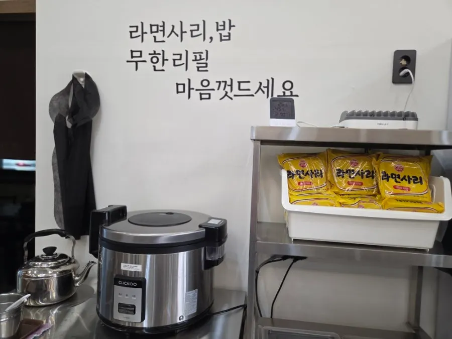 Self-service bar with rice and ramen noodles