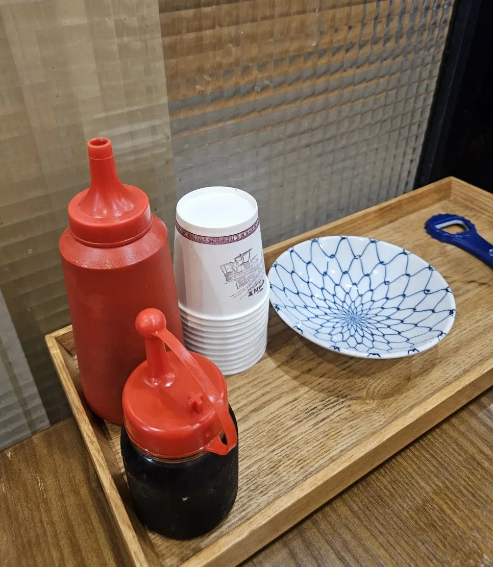 Basic seasonings and small plates on a seafood restaurant table