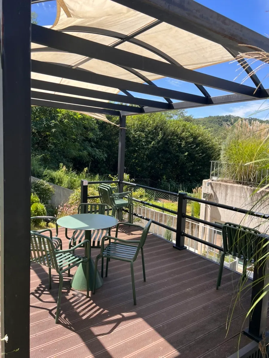 Tiered outdoor tables set up in back