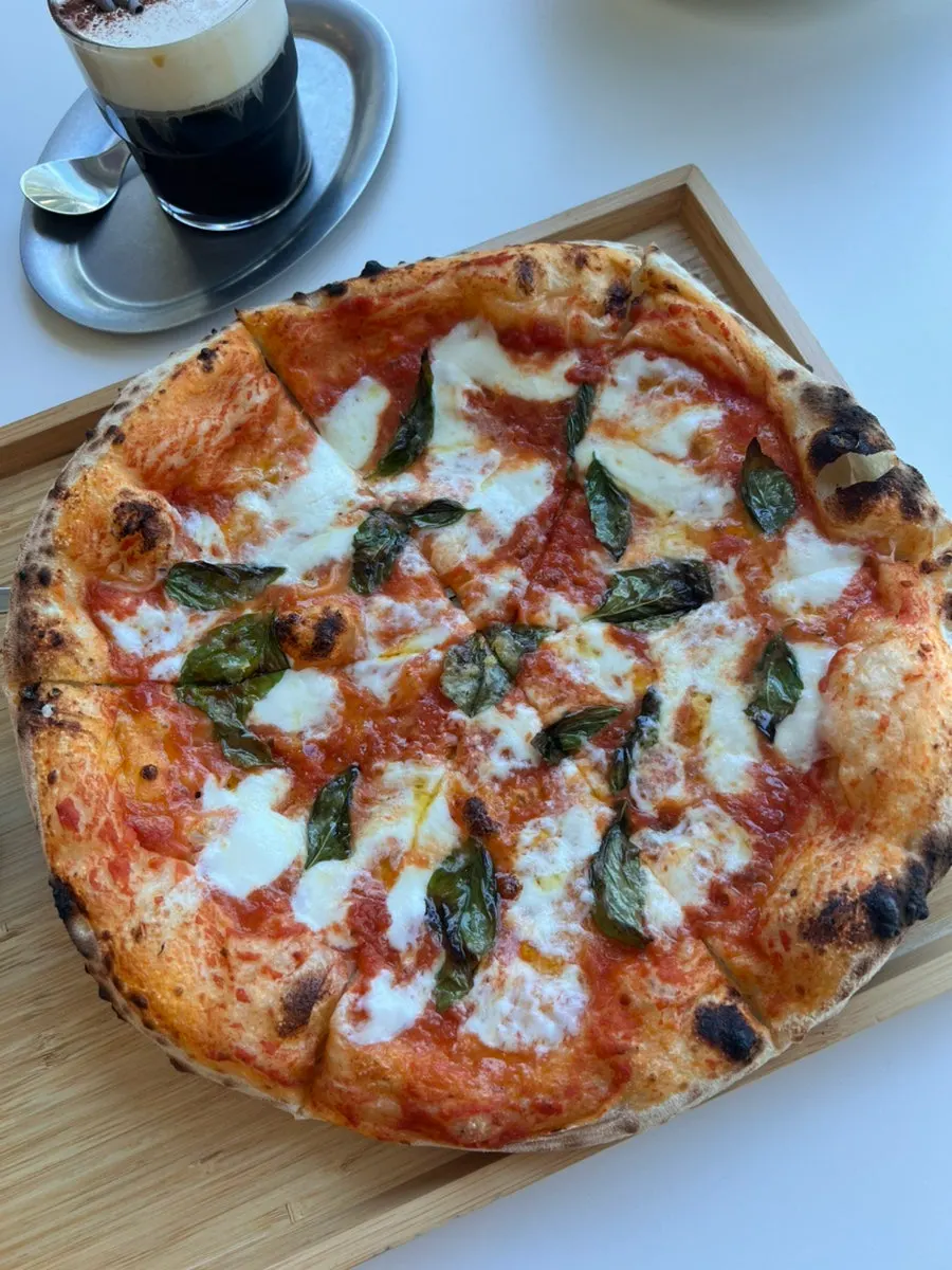 Pizza and drinks together on the table