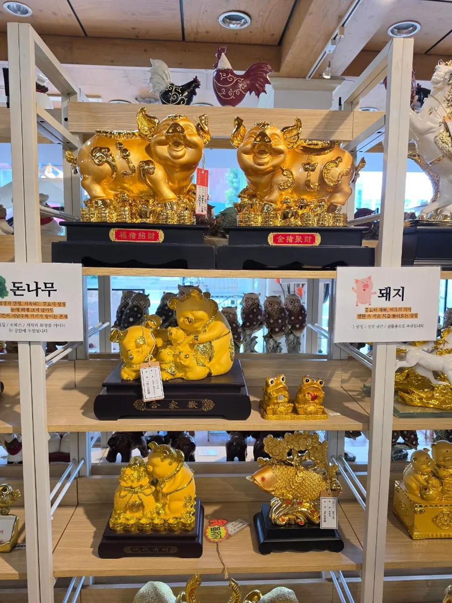 Golden owl and elephant ornaments