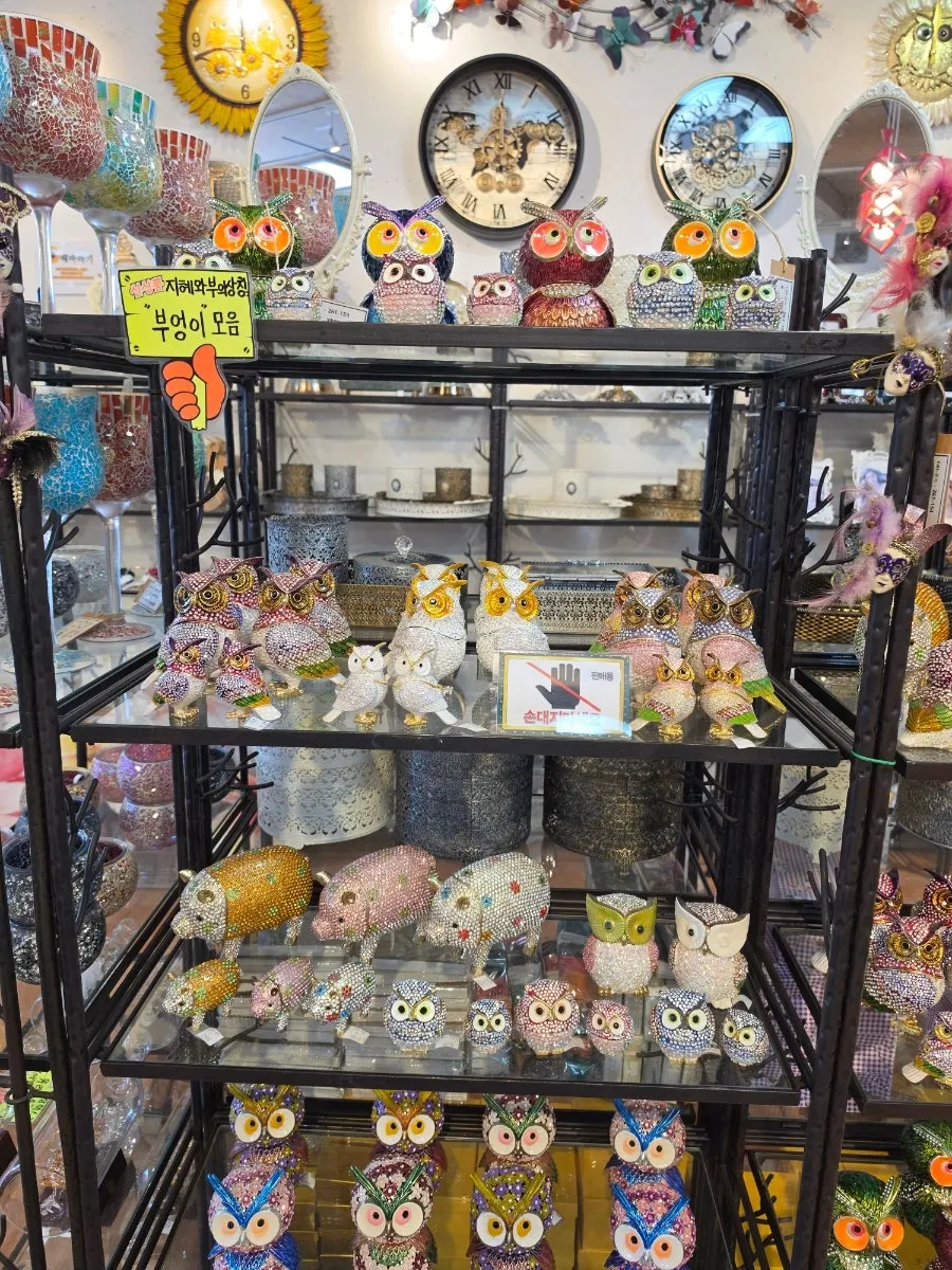 Owl ornaments and sunflower picture frames