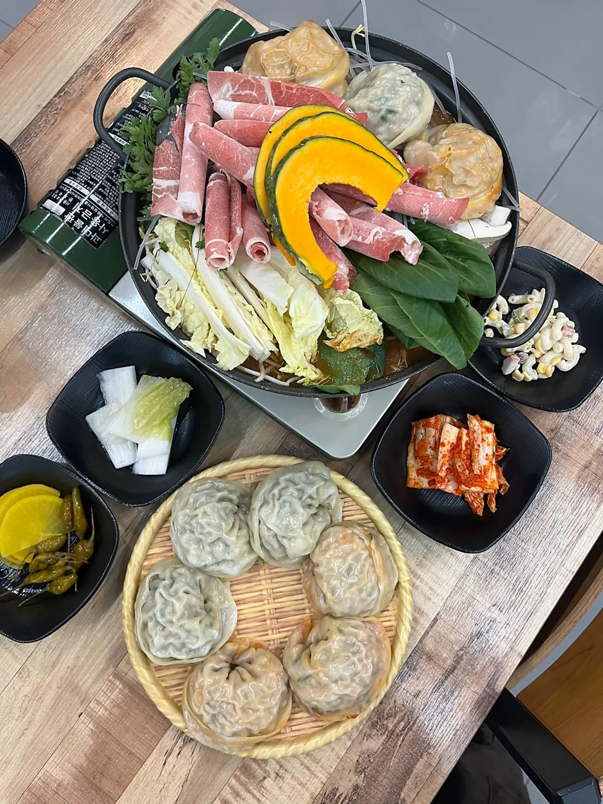 Three-person spicy handmade dumpling hot-pot spread