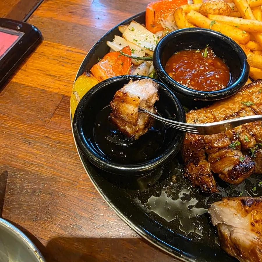 Whole pork belly steak with sides