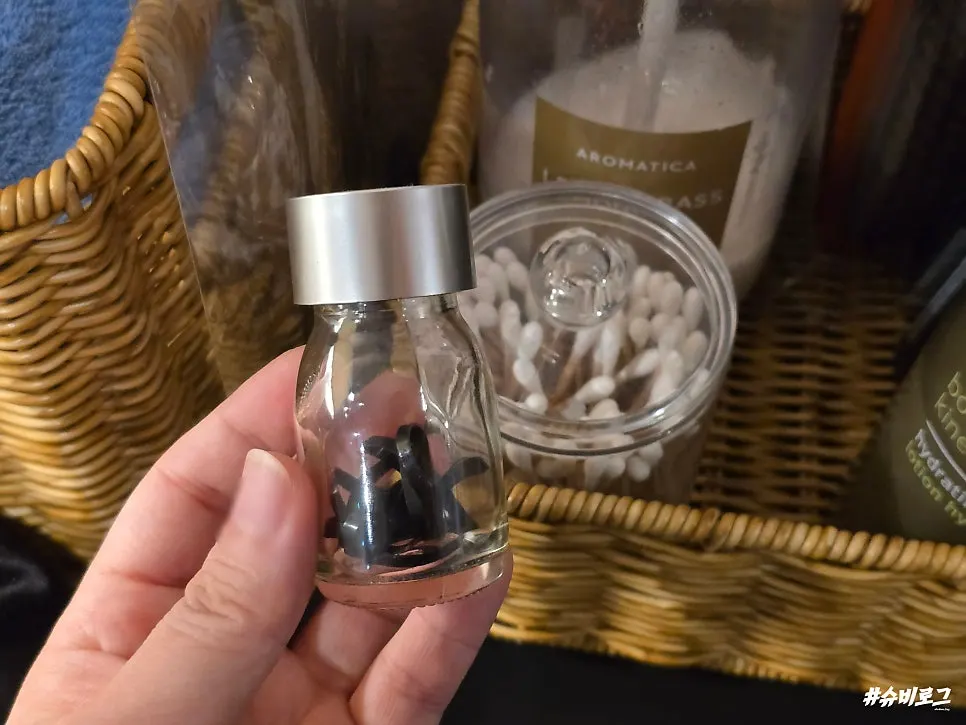 Toner, lotion, hair ties, cotton swabs and other amenities