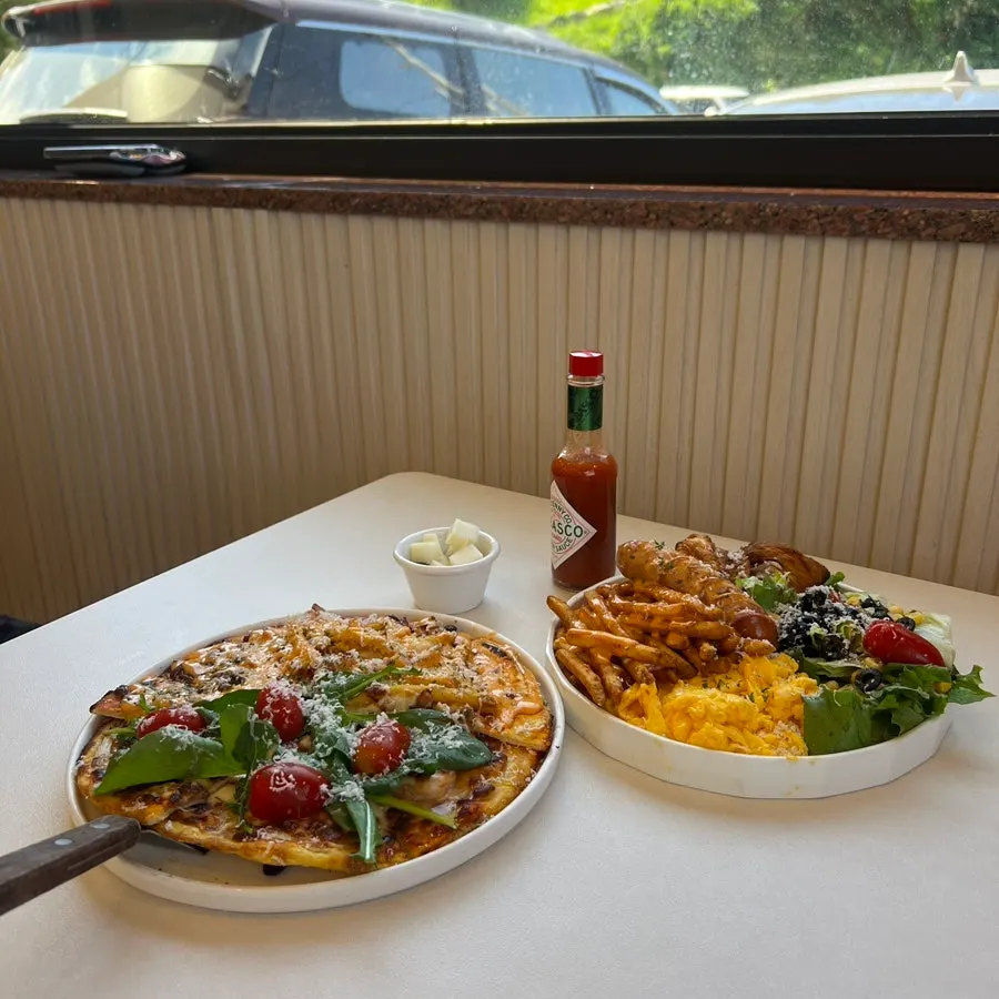 Outdoor space and tables at Pino Cafe