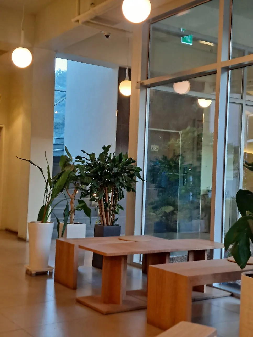 Tables and chairs in the 3rd-floor space at Siyudang