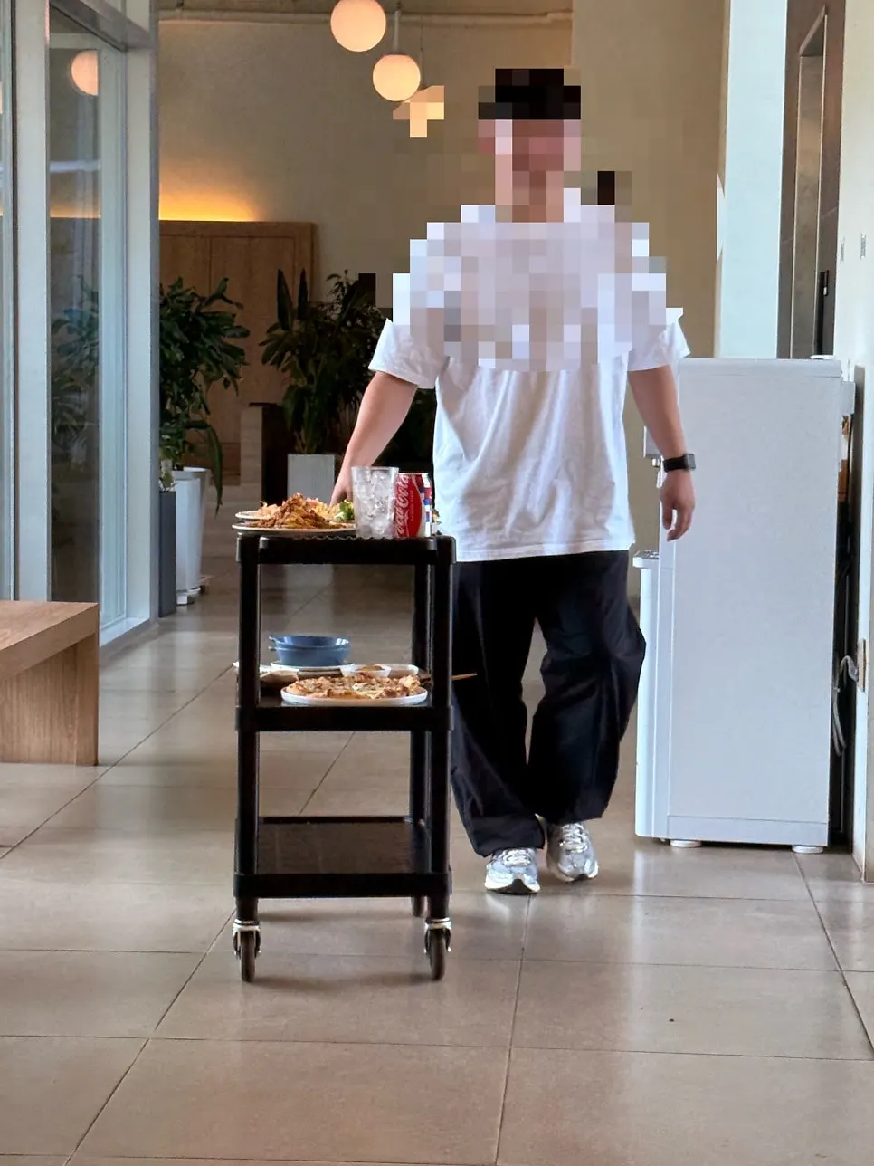 Cart used to carry menu items and elevator