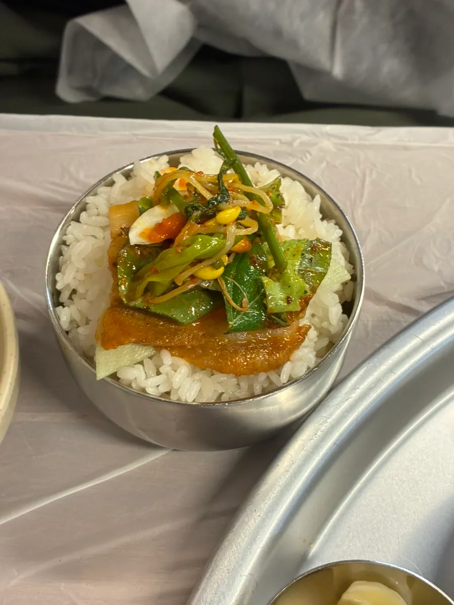 Samhap served with minari and bean sprouts