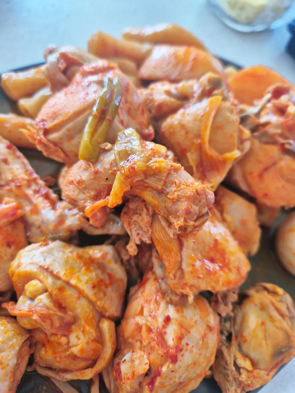 Potatoes and rice cakes packed generously into the stew