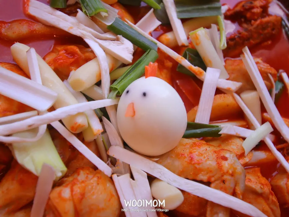 Dakdoritang topped with a chick-shaped egg