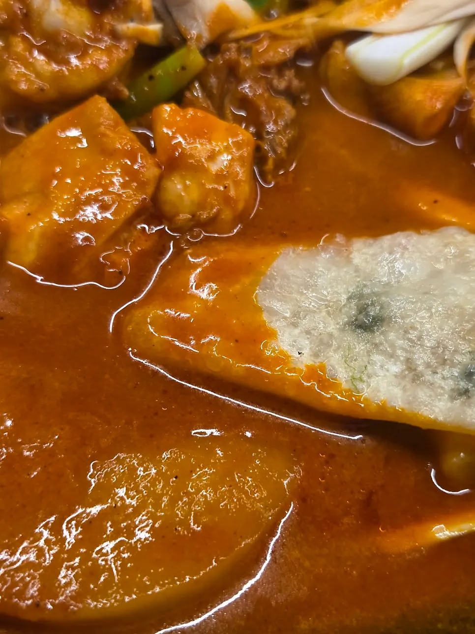 Flat mandu served alongside the dakdoritang