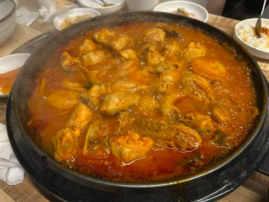 Chicken stew simmering on high heat