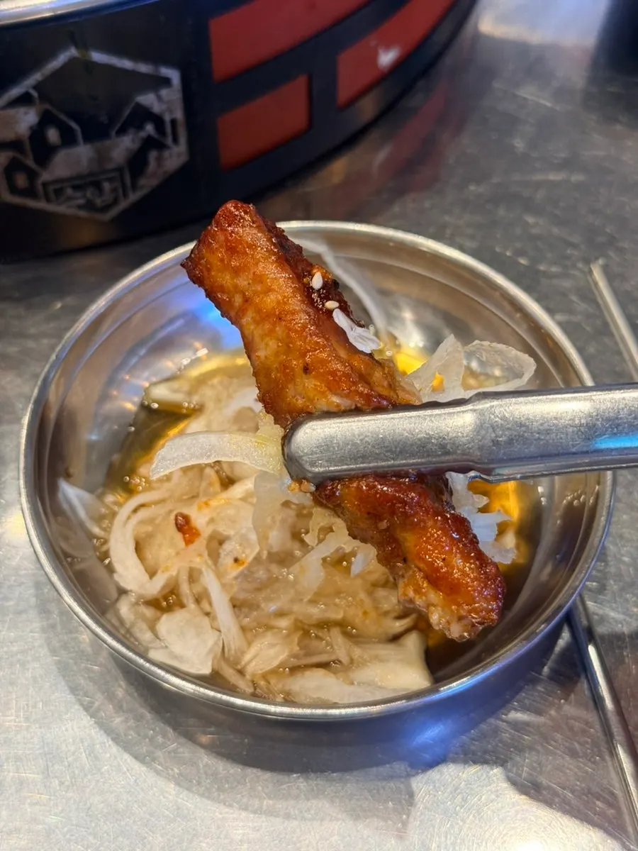 Garlic and spicy jjokgalbi served half-and-half