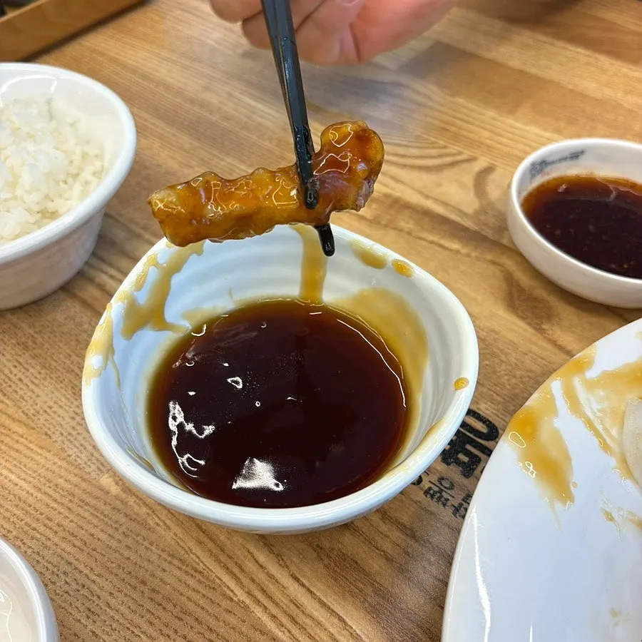 Extra sauce requested for the sweet and sour pork
