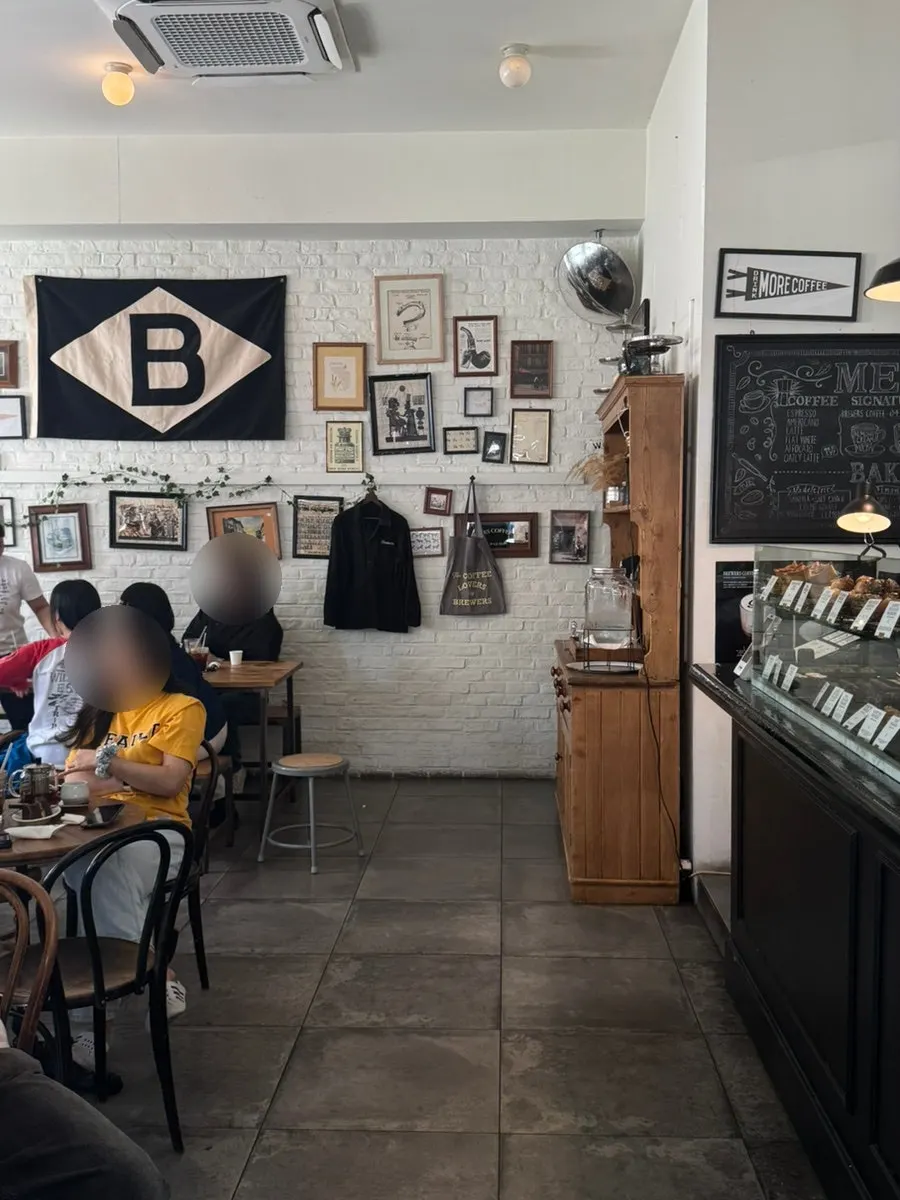 Interior of Brewers Coffee packed with customers
