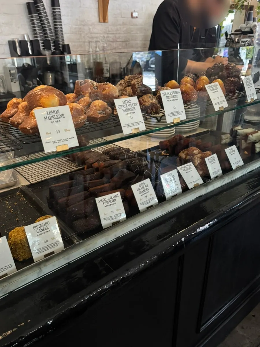 Financiers and madeleines on display at Brewers Coffee
