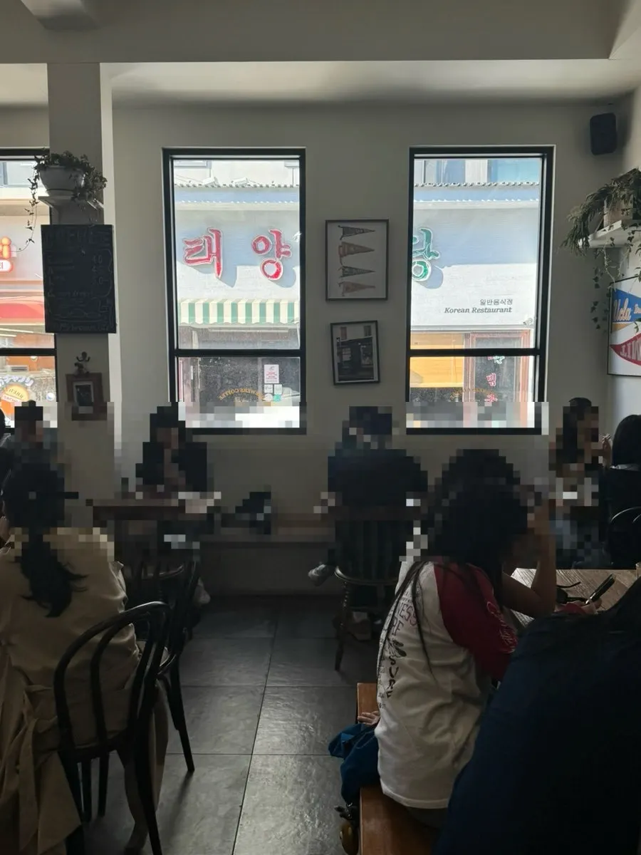 Interior of Brewers Coffee with a shared table