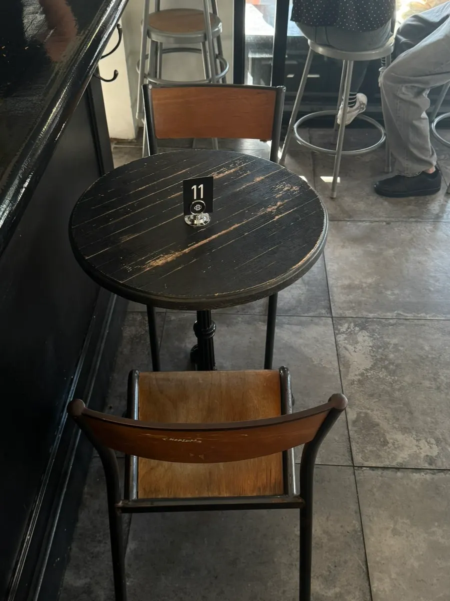 Café space with black, white and wood interior
