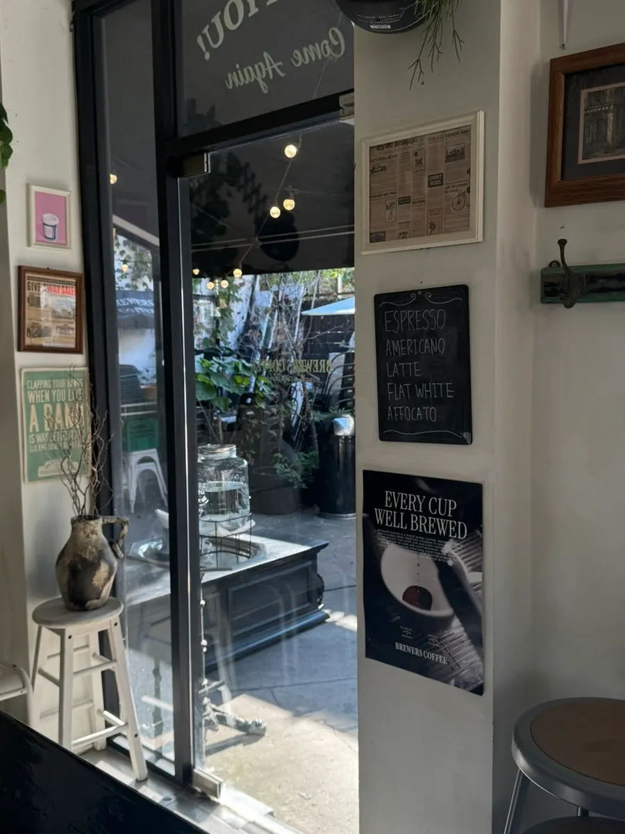 Café interior browsed while waiting for a takeout order