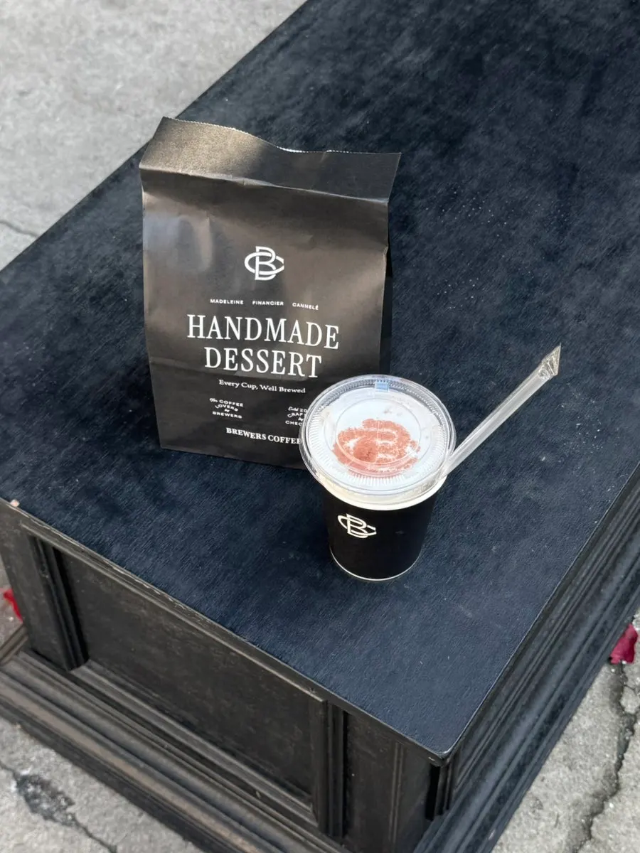Black packaging and cup holder from Brewers Coffee