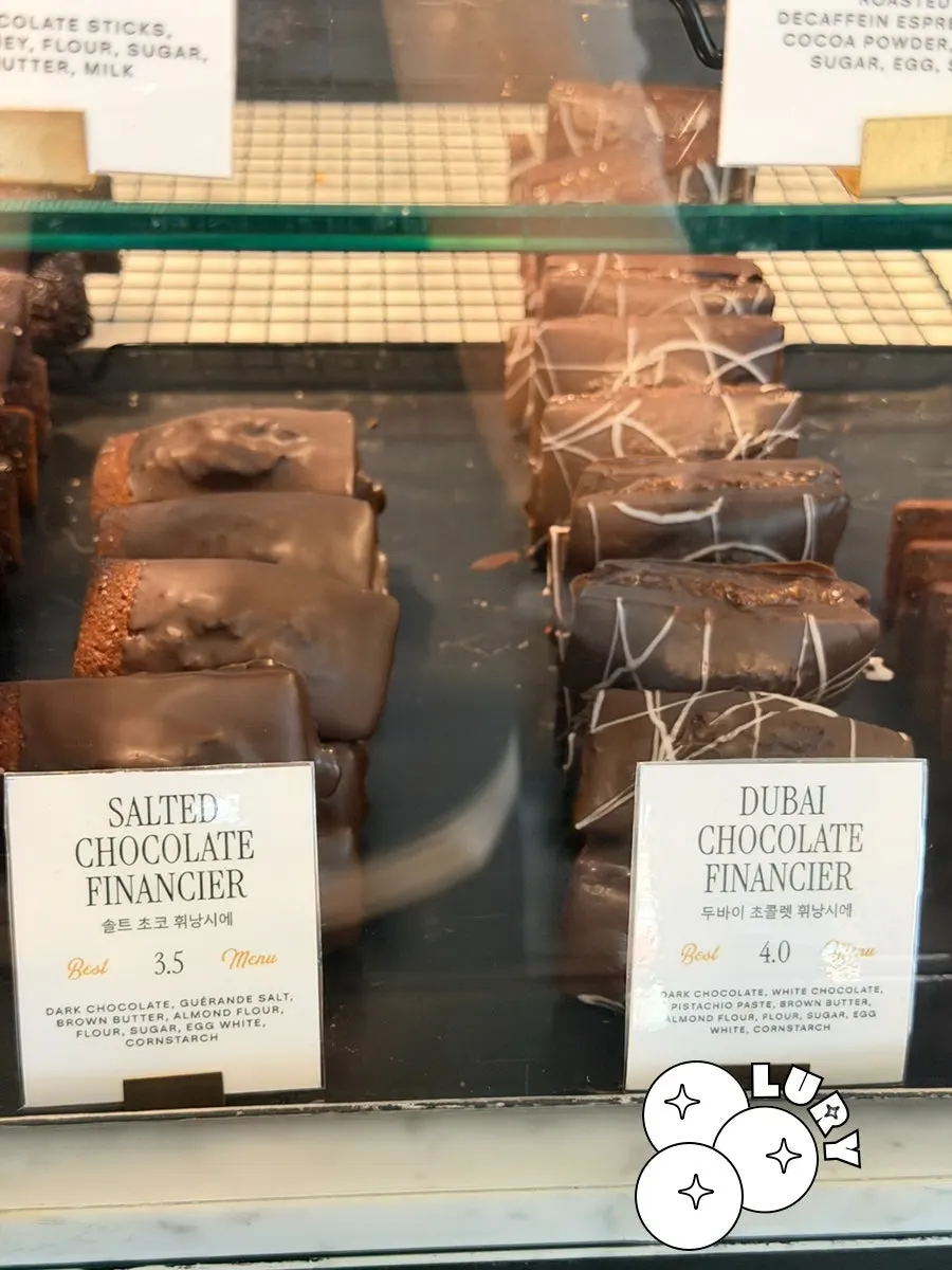 Canelés and financiers in the showcase