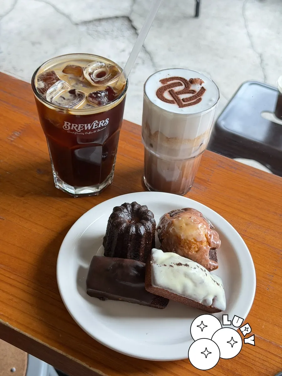 Drinks and baked treats set on the table at Brewers Coffee