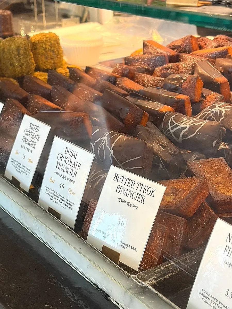Display case with Dubai chocolate financiers