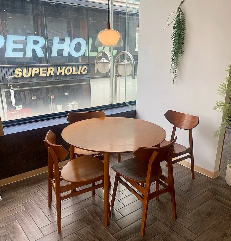 Café interior with wooden tables
